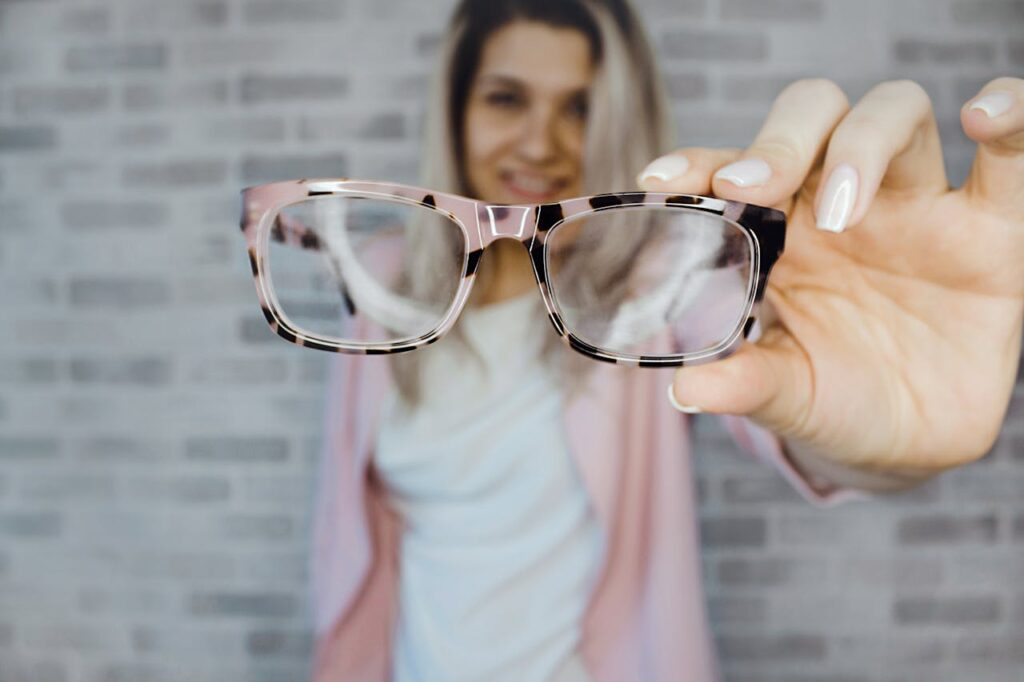 pexels-photo-975668 Selective Focus Photography of Pink and Black Framed Eyeglasses
